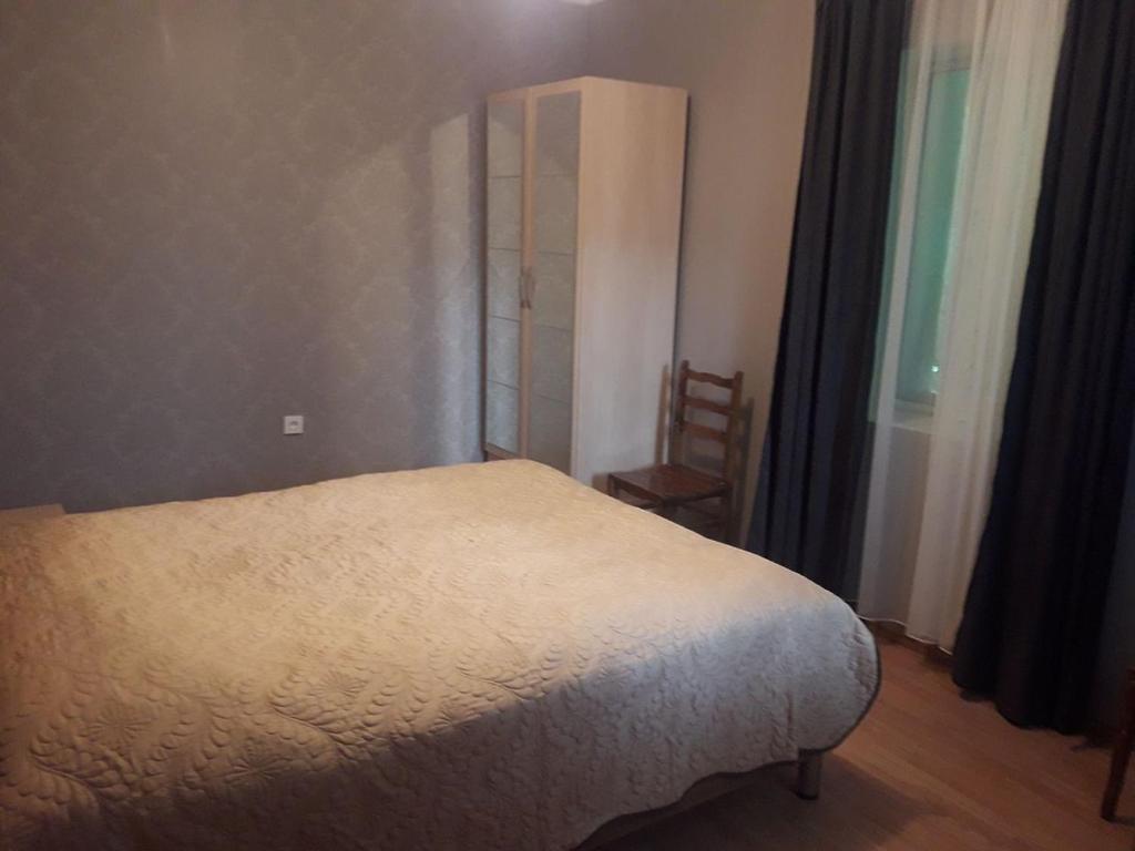 Postel nebo postele na pokoji v ubytování GergHouse