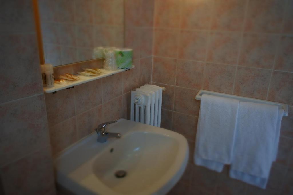 Koupelna v ubytování Hotel Loreto