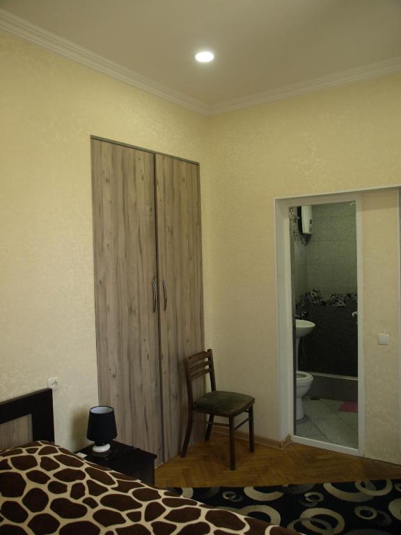 Postel nebo postele na pokoji v ubytování Guest house Ebralidze