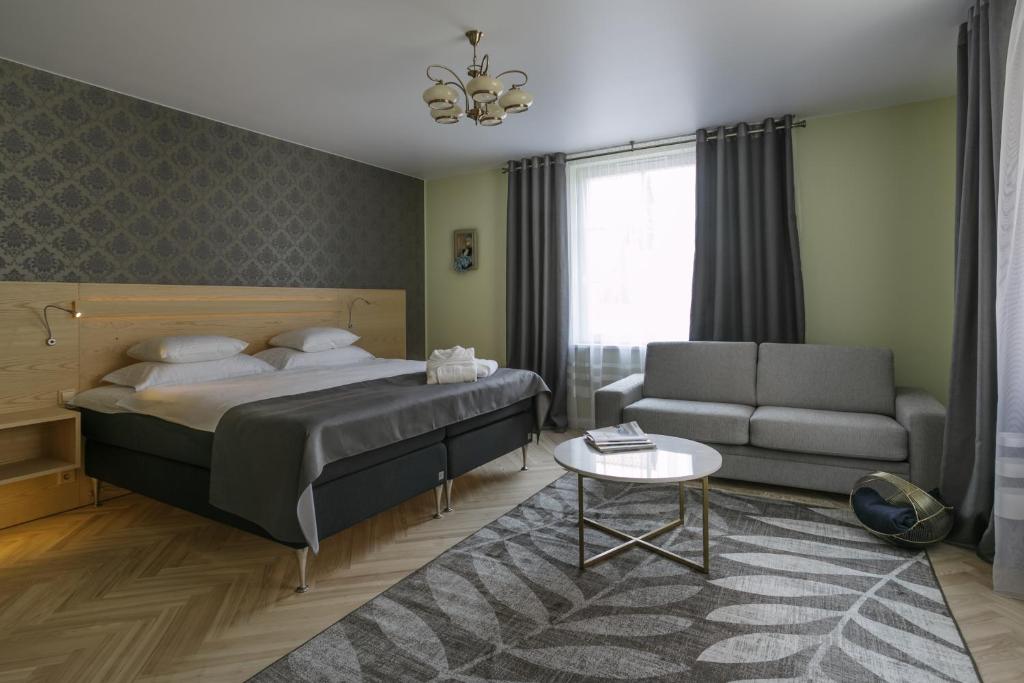 Postel nebo postele na pokoji v ubytování Dönhoff Residence