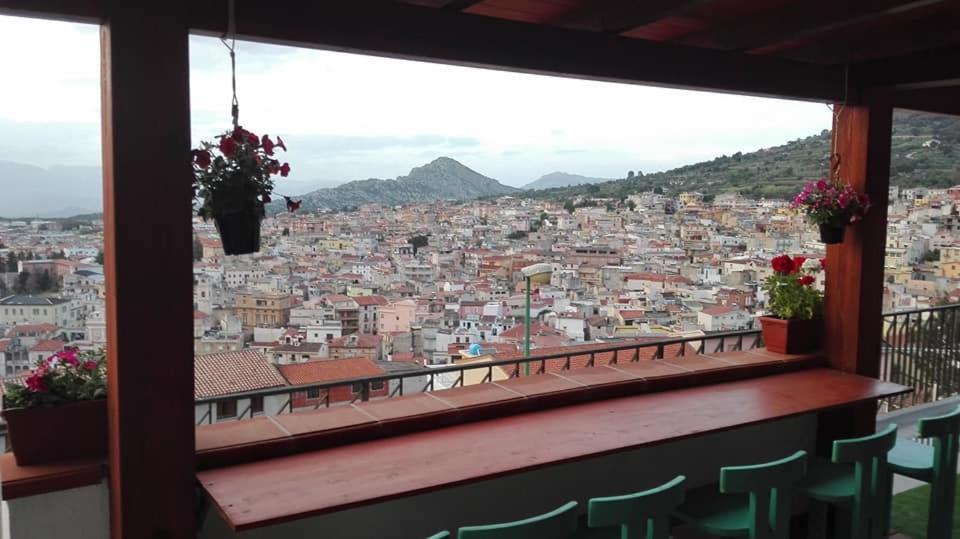 a balcony with a view of a city at B&B Bella Vista in Dorgali