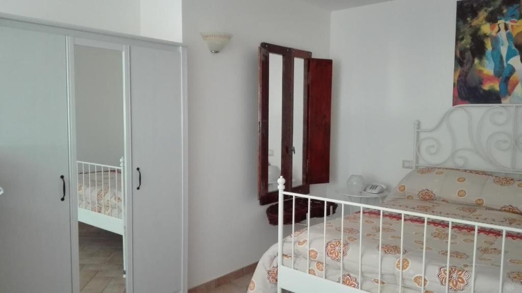 A bed or beds in a room at Cominium Benessere