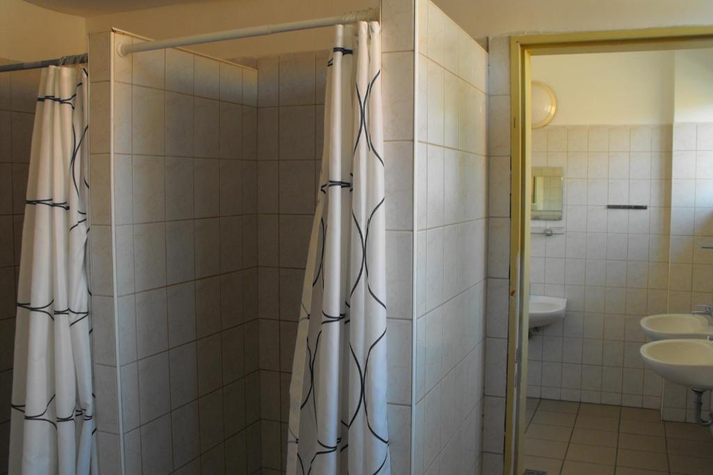 Koupelna v ubytování József Attila Guesthouse
