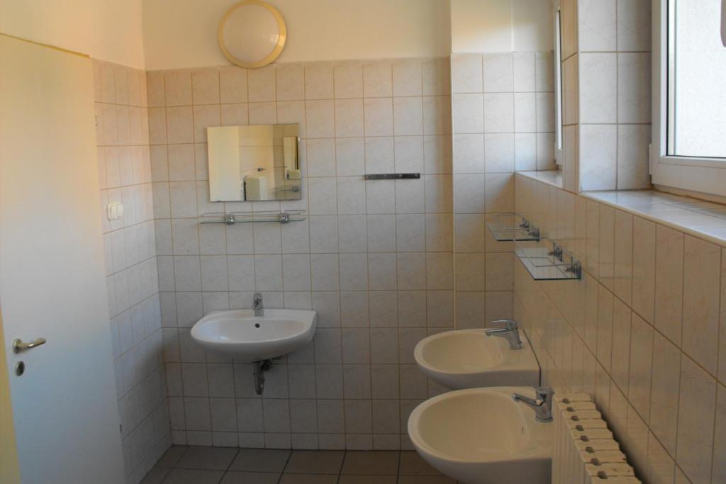 Koupelna v ubytování József Attila Guesthouse