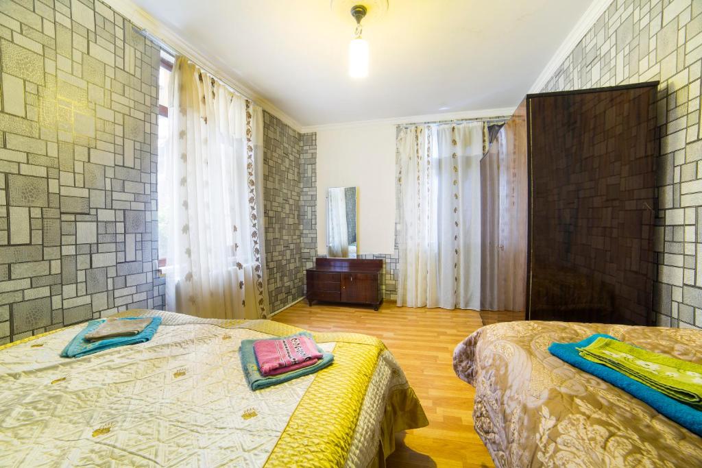 Postel nebo postele na pokoji v ubytování Anastasia Guesthouse