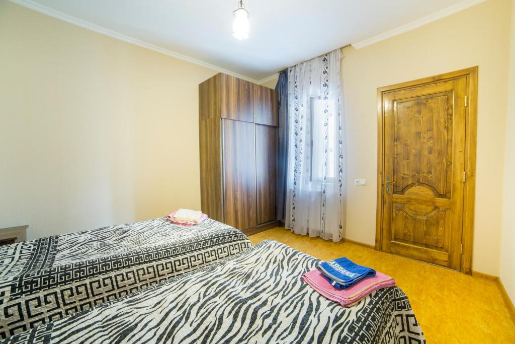 Postel nebo postele na pokoji v ubytování Anastasia Guesthouse