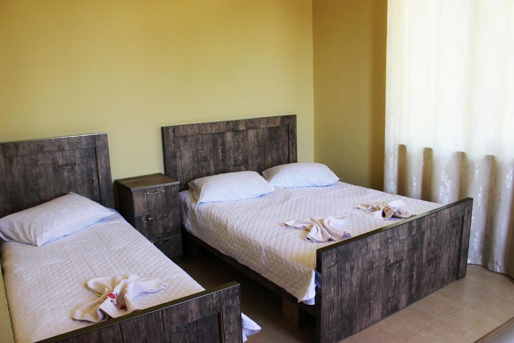 Postel nebo postele na pokoji v ubytování Hotel Evrazia