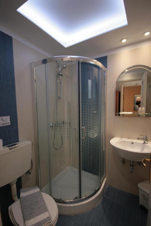 Koupelna v ubytování Hotel Zeus