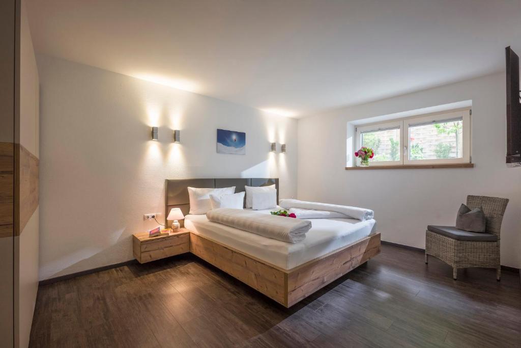 A bed or beds in a room at Apart Dengg