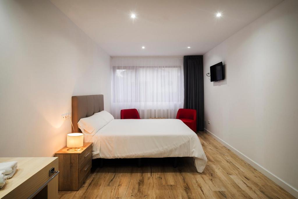 Postel nebo postele na pokoji v ubytování Hotel Montañés