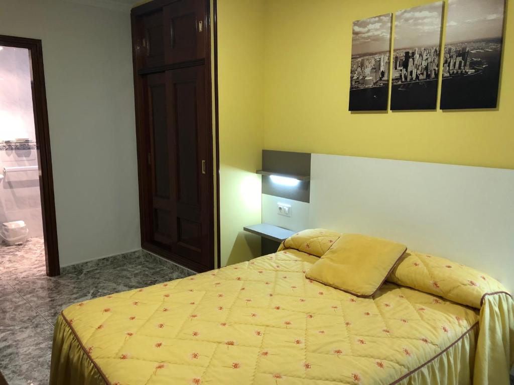 Postel nebo postele na pokoji v ubytování Pension Casa Prieto