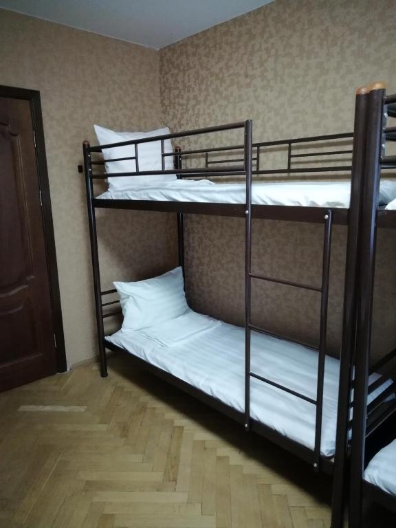 Postel nebo postele na pokoji v ubytování Hostel "От рассвета до заката"