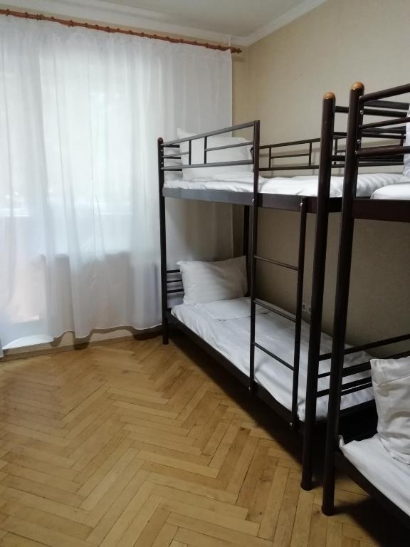 Postel nebo postele na pokoji v ubytování Hostel "От рассвета до заката"