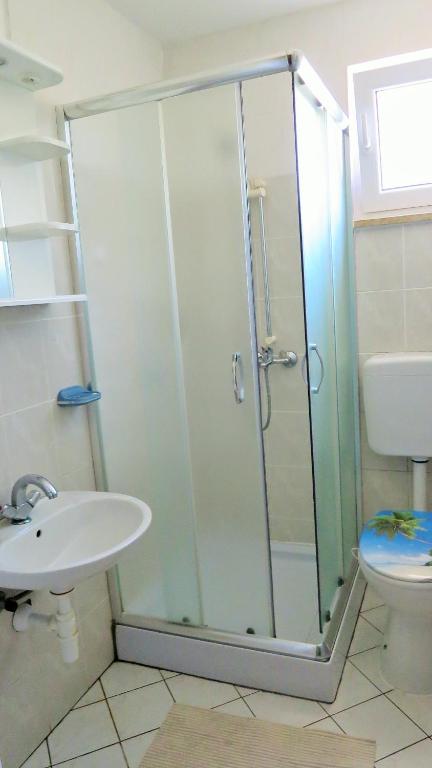 Łazienka w obiekcie Apartments Rukavina