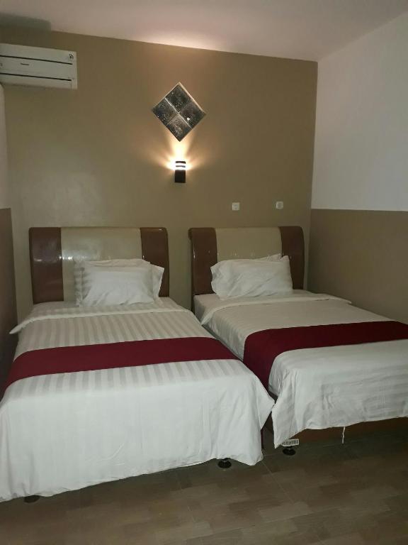 Postel nebo postele na pokoji v ubytování The New Orlinds Guest House