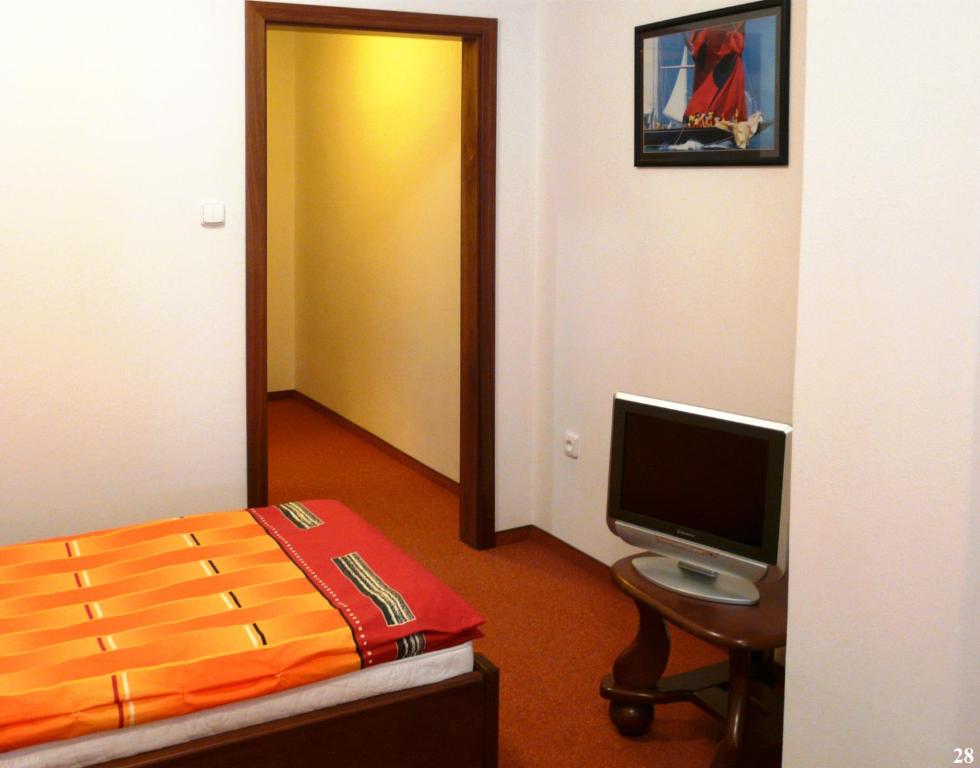 Telewizja i/lub zestaw kina domowego w obiekcie Resort Maják
