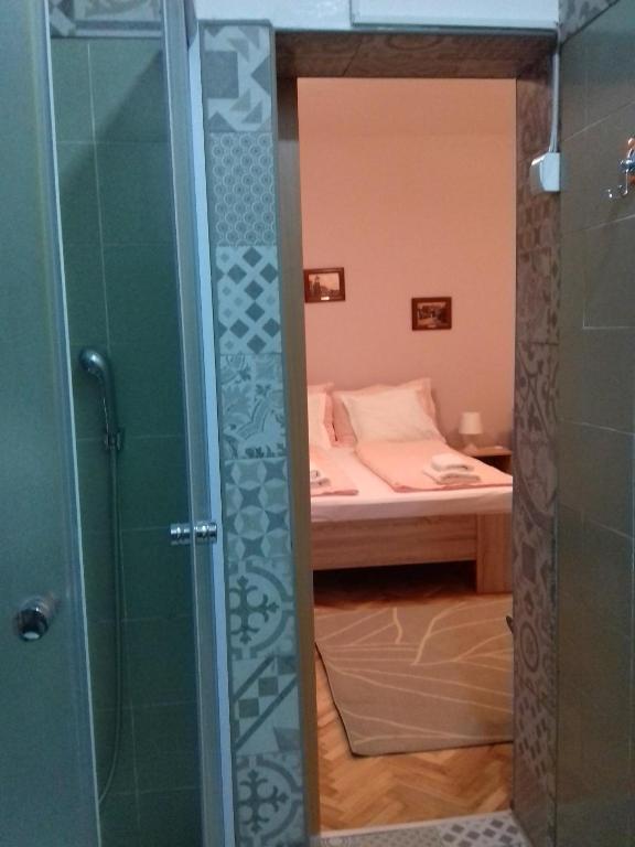 Posteľ alebo postele v izbe v ubytovaní Guest House Dimitrije