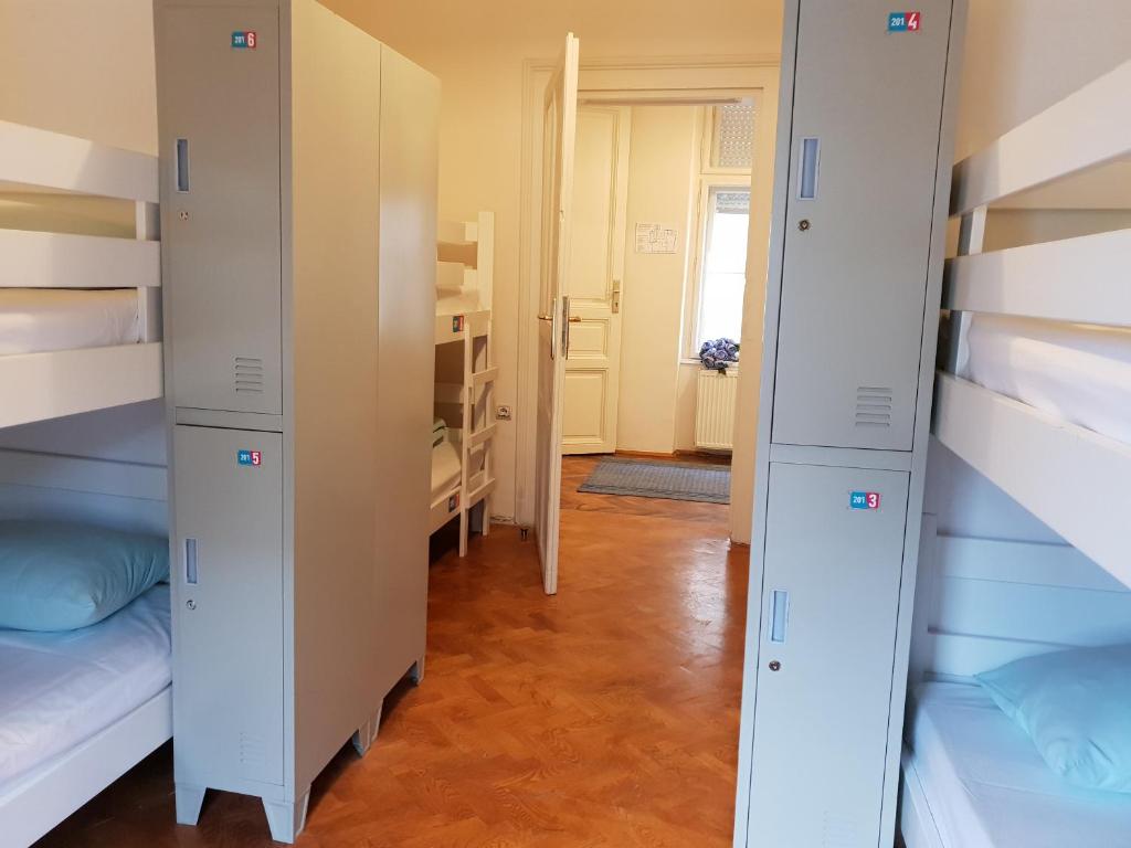 Postel nebo postele na pokoji v ubytování Booking BnB