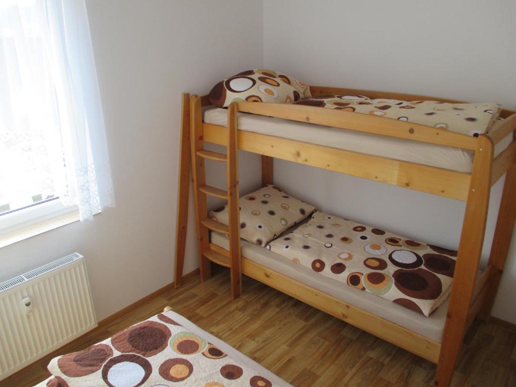 Postel nebo postele na pokoji v ubytování Apartmán Petra