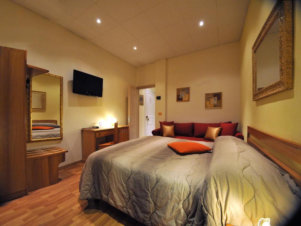Postel nebo postele na pokoji v ubytování Hotel Alexander & Spa