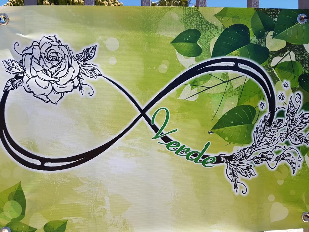 a painting of a heart with a flower at L'infinito Verde in Floridia