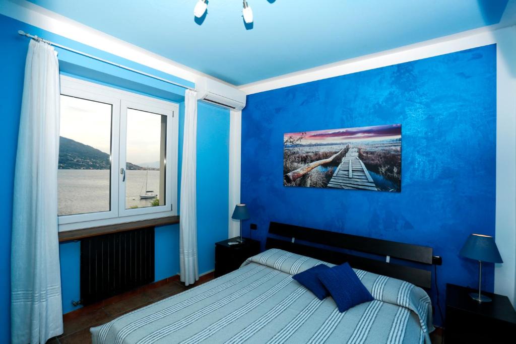Postel nebo postele na pokoji v ubytování Casa Vacanze La Nautica