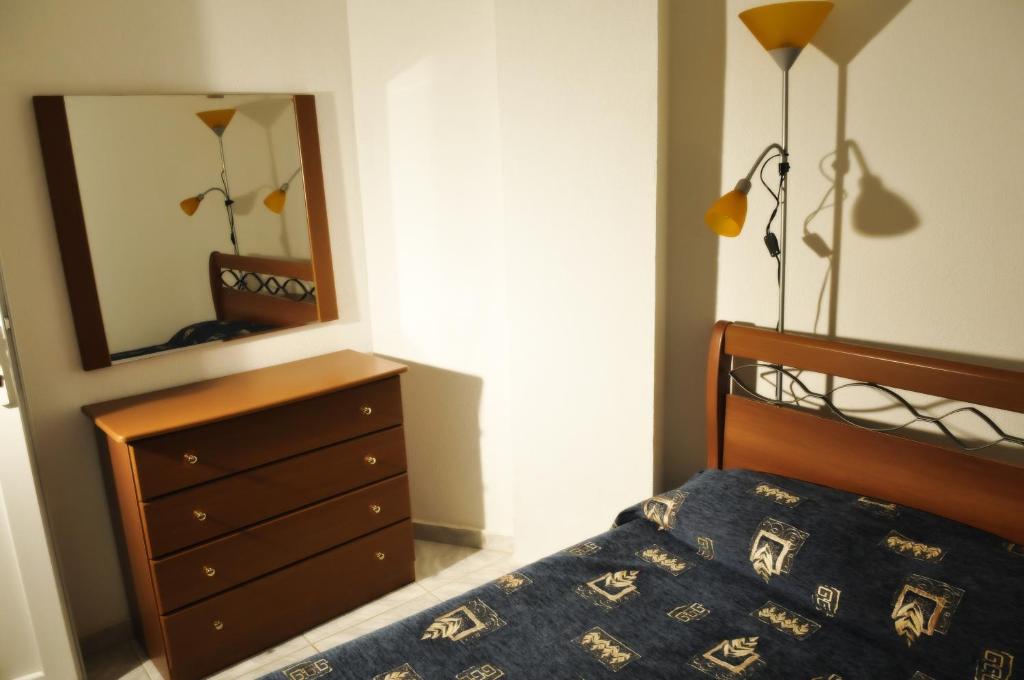Postel nebo postele na pokoji v ubytování Asterias Hotel