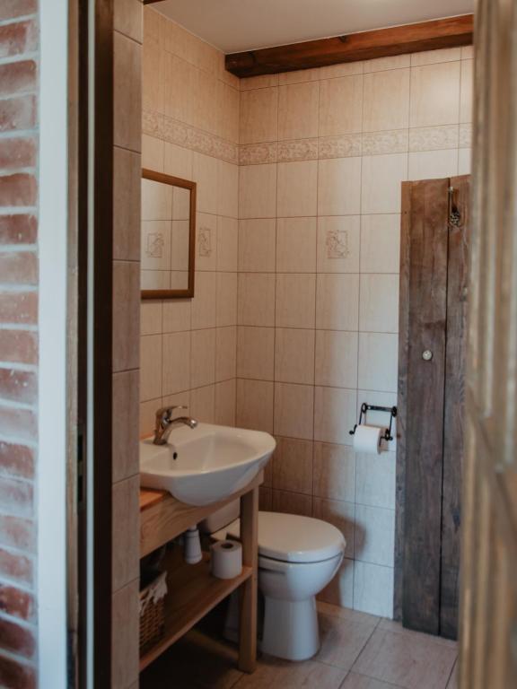 Kúpeľňa v ubytovaní Domek wypoczynkowy Piotr