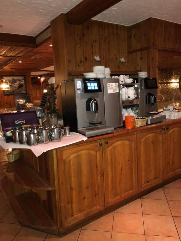 Kuchyň nebo kuchyňský kout v ubytování Hotel City