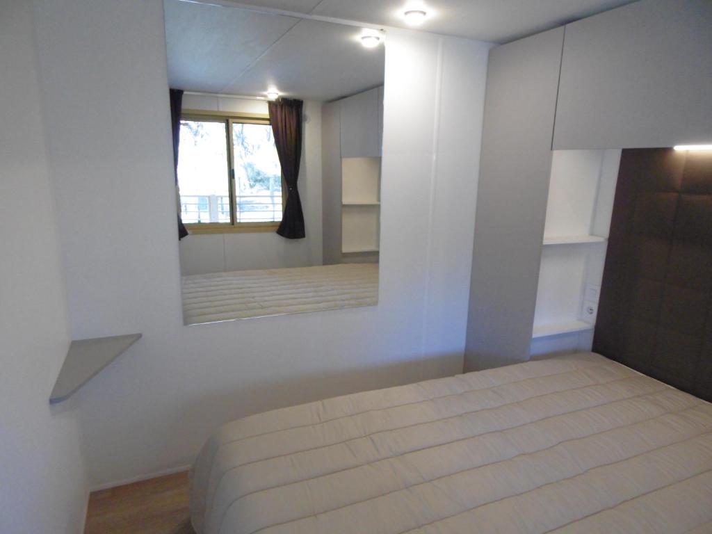 Postel nebo postele na pokoji v ubytování Camping Eden
