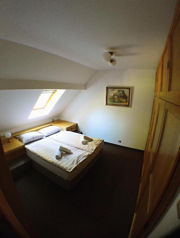 Postel nebo postele na pokoji v ubytování Hotel Gabriela