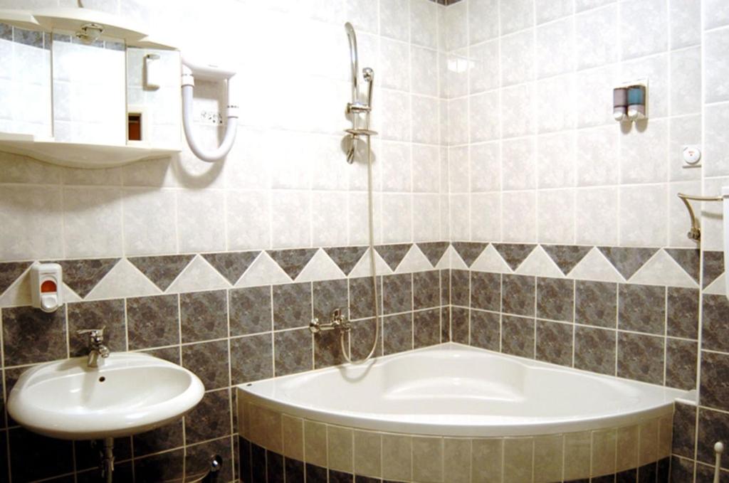 Koupelna v ubytování Hotel Slodes