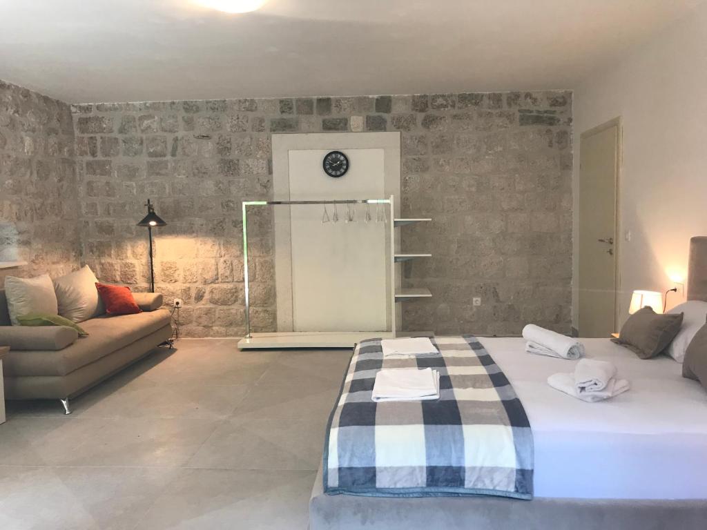 Postel nebo postele na pokoji v ubytování Stone house 264