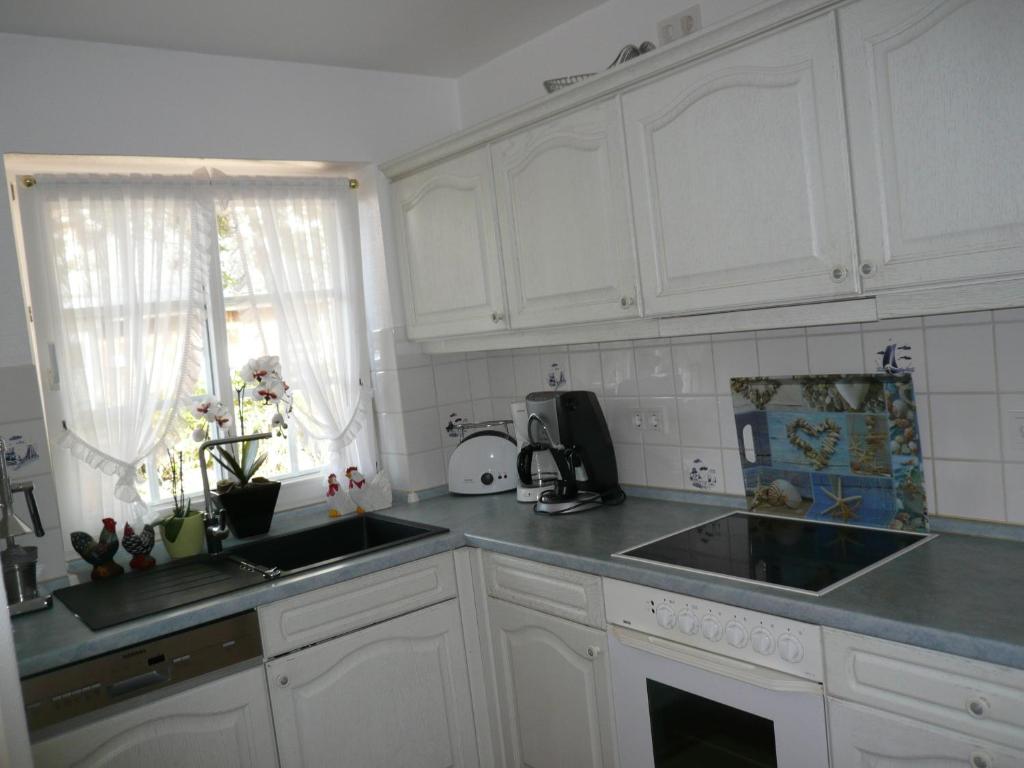 Kuchyň nebo kuchyňský kout v ubytování Kastanienhüs Apartment