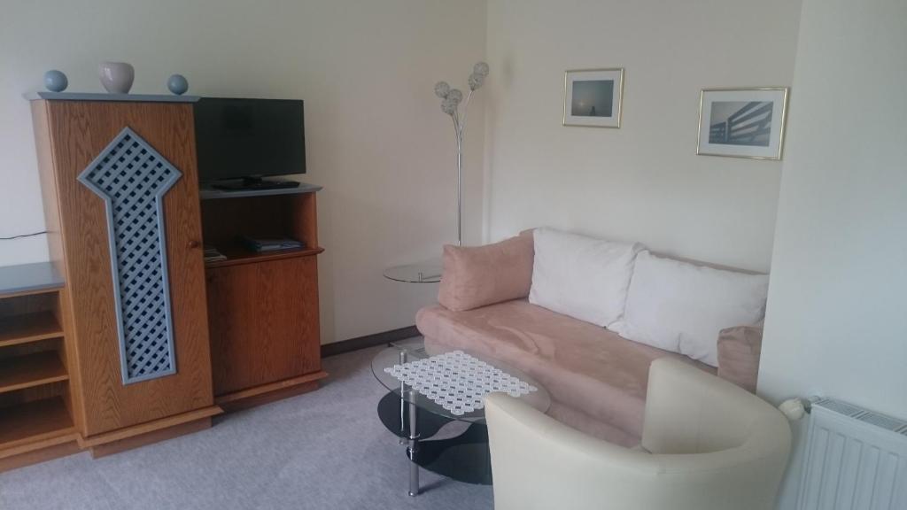 TV a/nebo společenská místnost v ubytování Appartements Koffler