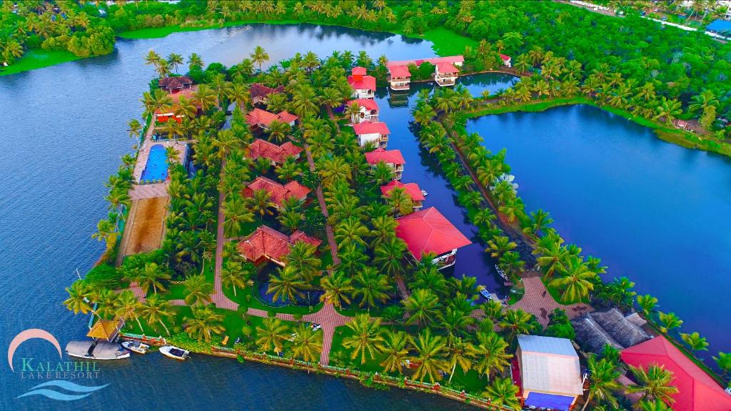 an aerial view of an island in the water at Kalathil Lake Resort in Vaikom