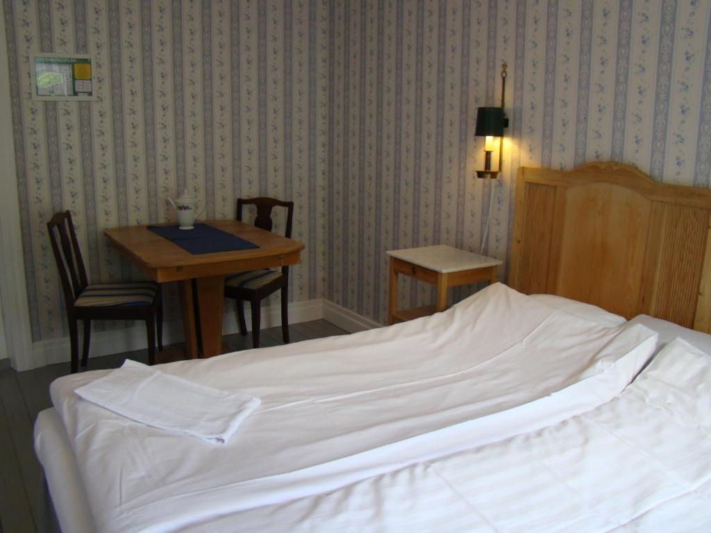 Postel nebo postele na pokoji v ubytování ÖlandsRo B&B