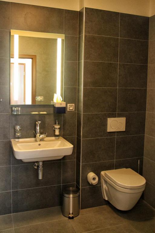 Koupelna v ubytování Hotel U Kašny