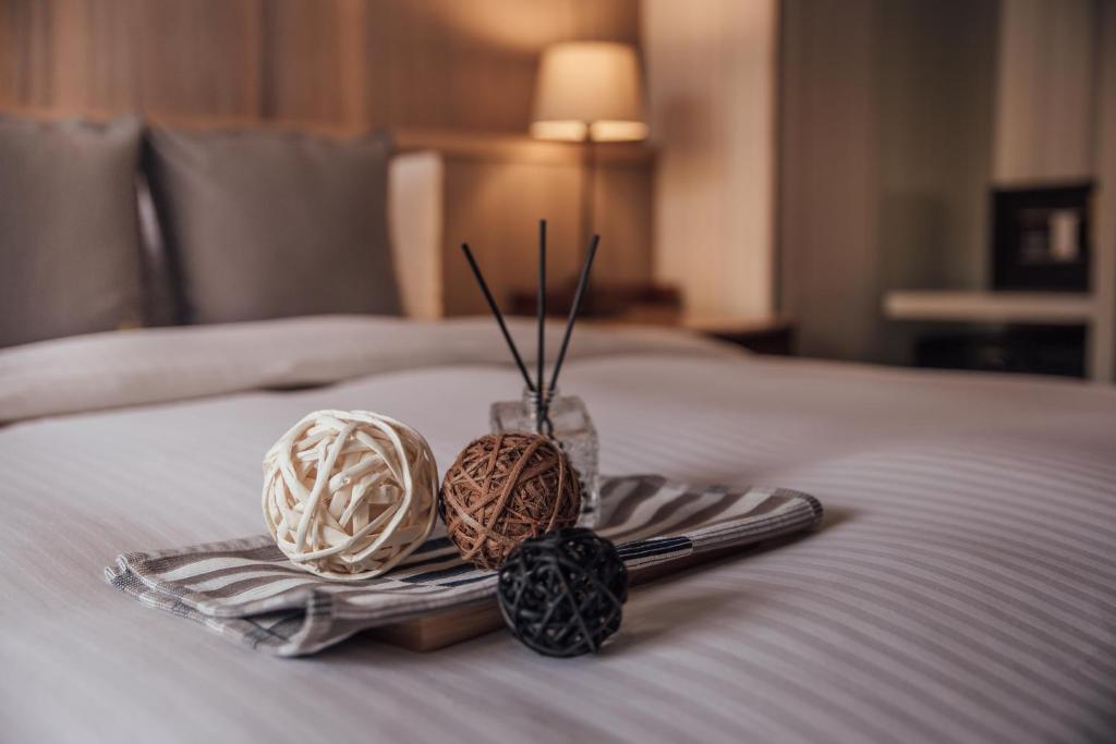 Postel nebo postele na pokoji v ubytování Muzik Hotel - Ximending Xining Branch