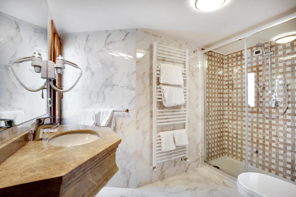 Koupelna v ubytování Hotel Casanova