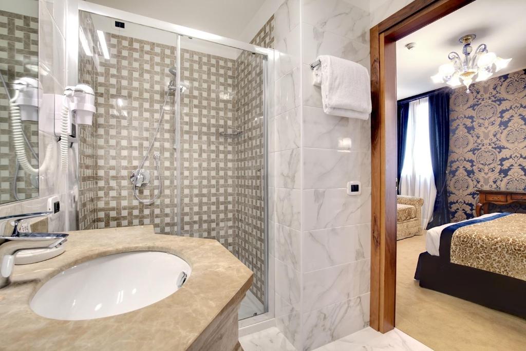 Koupelna v ubytování Hotel Casanova