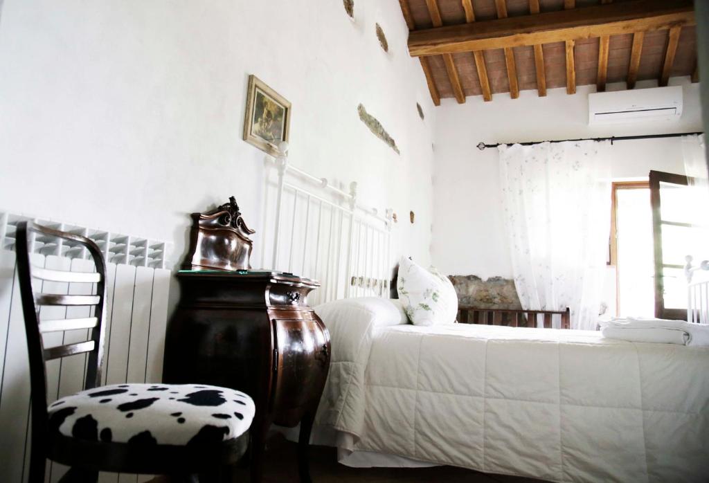 Postel nebo postele na pokoji v ubytování Agriturismo la Gioia