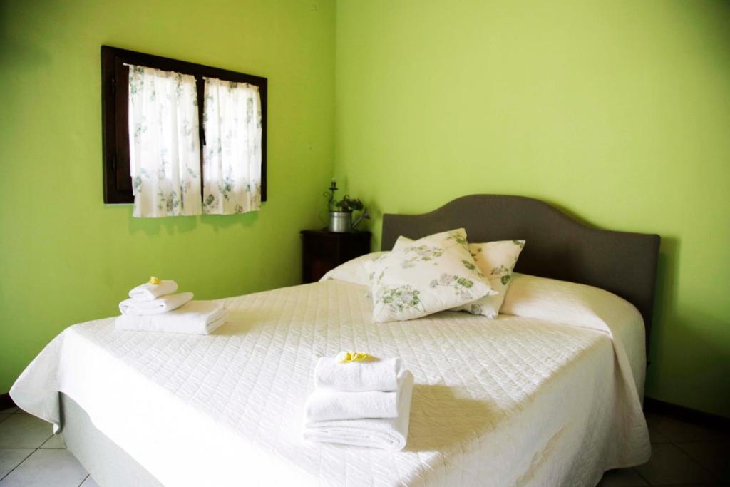 Postel nebo postele na pokoji v ubytování Agriturismo la Gioia