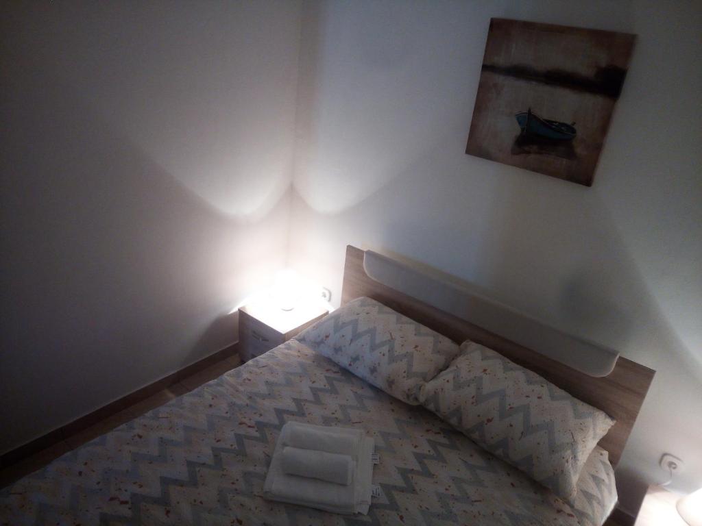 Postel nebo postele na pokoji v ubytování Apartman Pajo