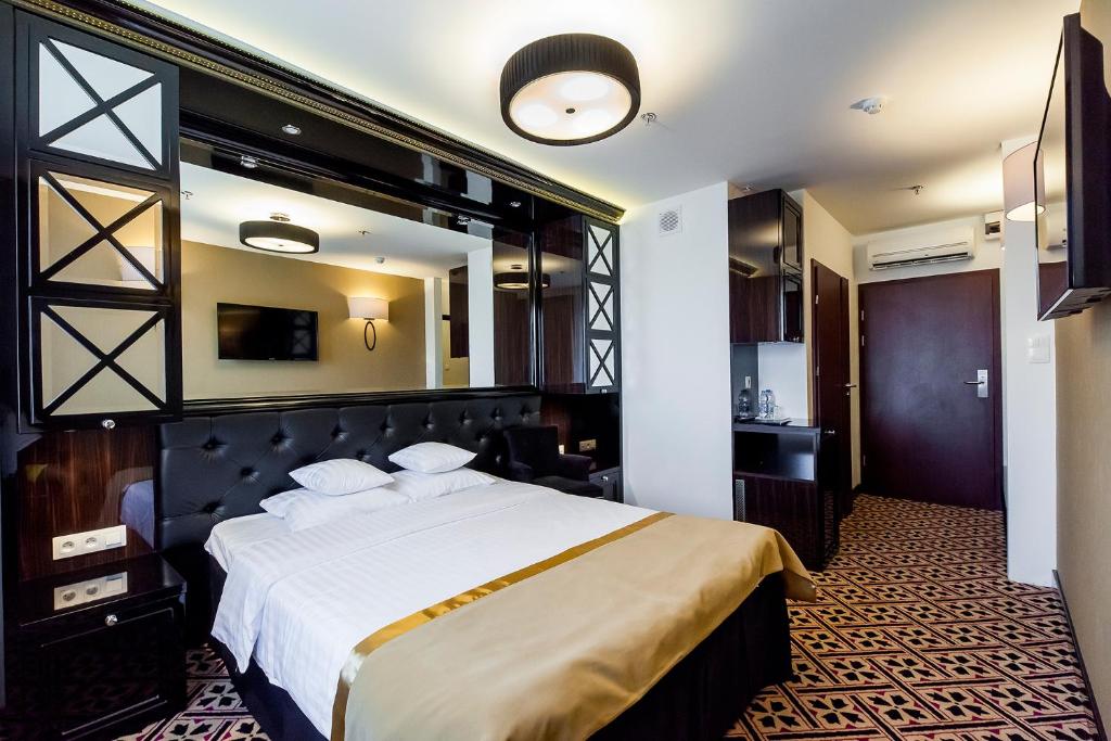Postel nebo postele na pokoji v ubytování Hotel 500