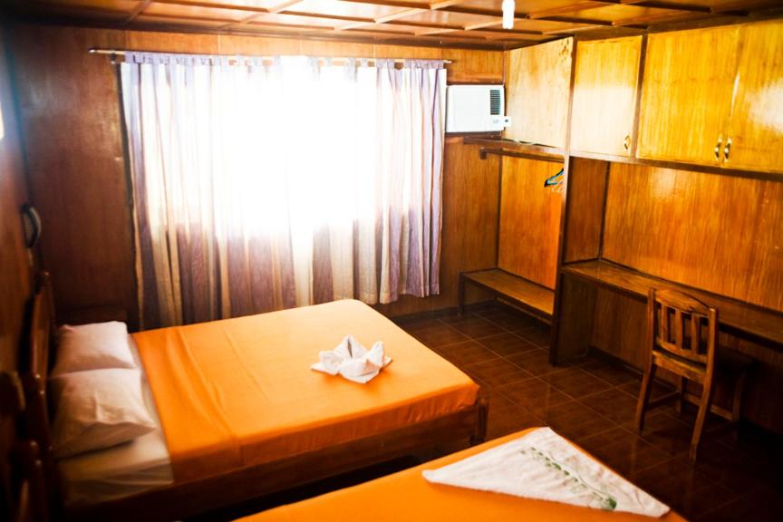 Postel nebo postele na pokoji v ubytování Vitton Resort
