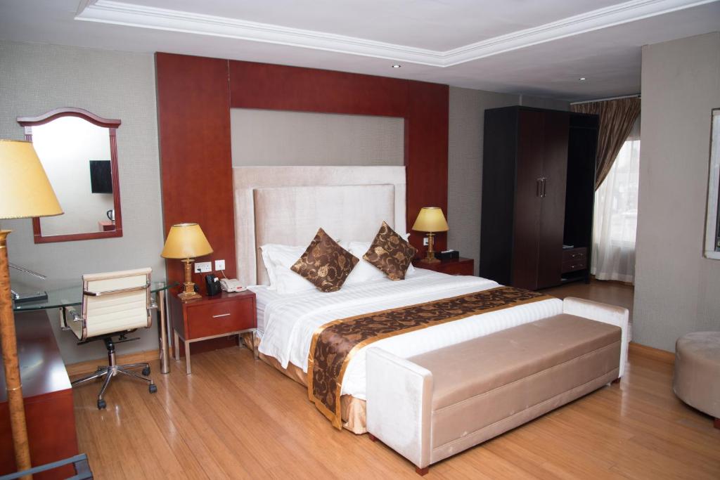 Postel nebo postele na pokoji v ubytování Hotel Sunshine Enugu