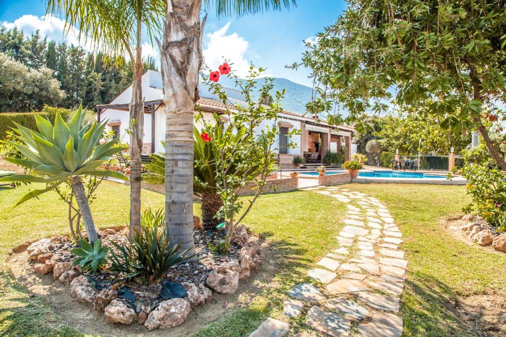 Vonkajšia záhrada v ubytovaní Cubo's Villa Ruiz