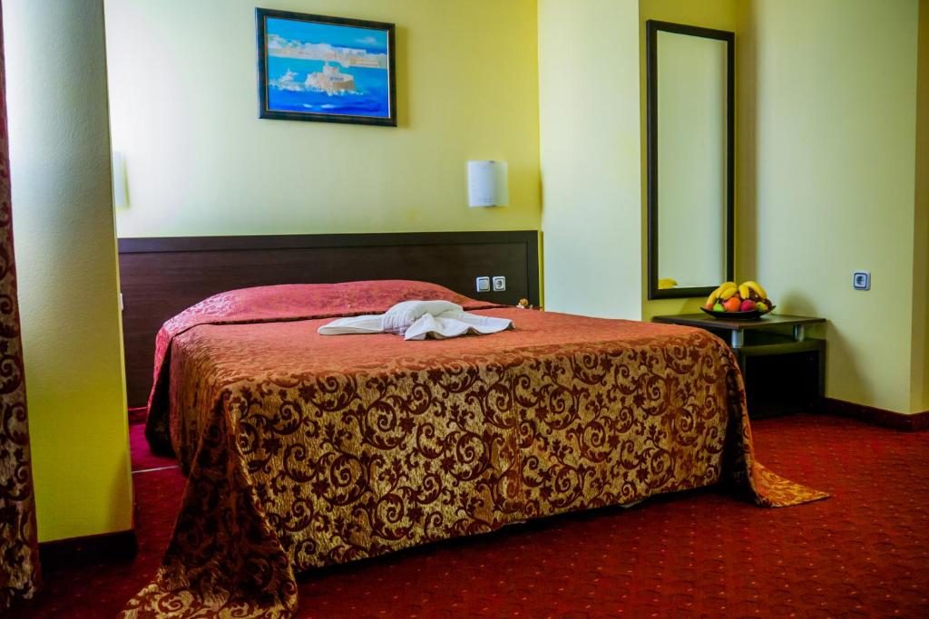 Postel nebo postele na pokoji v ubytování Hotel Kabile