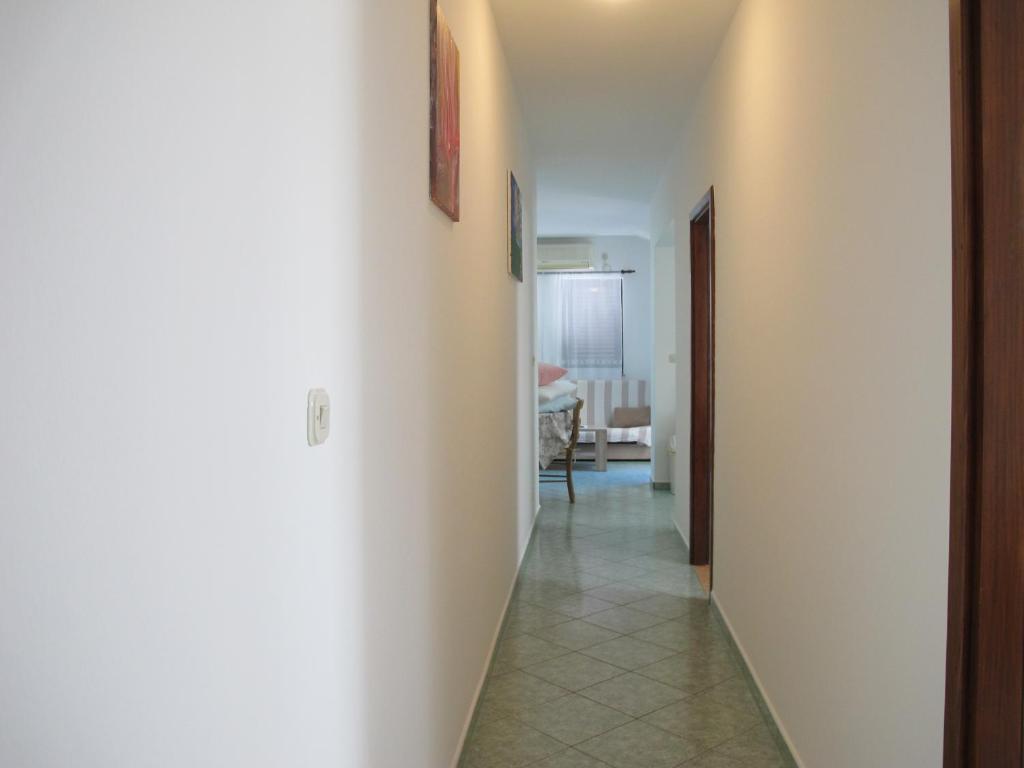 Postel nebo postele na pokoji v ubytování Apartmani Stille